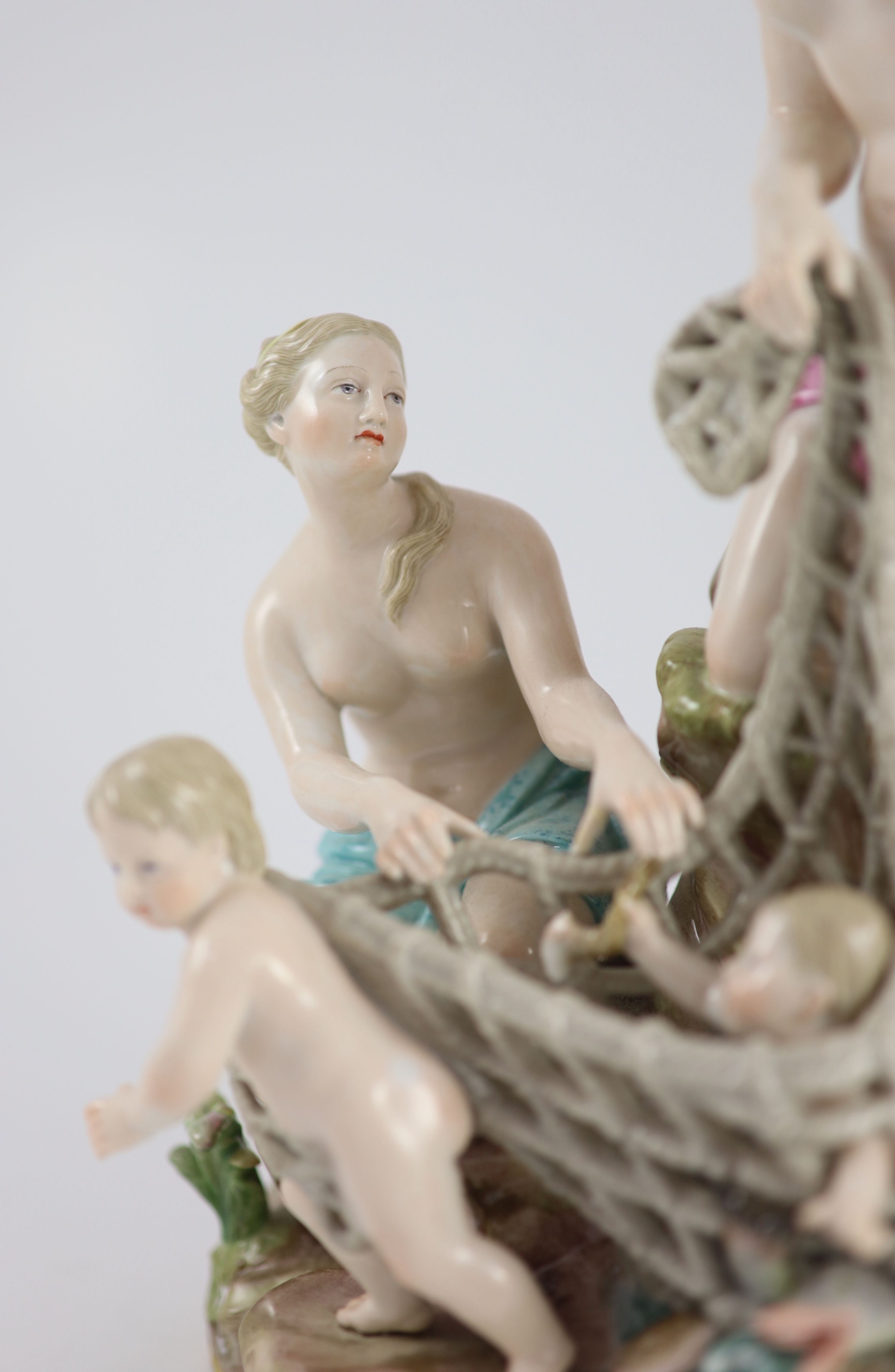 A Meissen group ‘The Capture of the Tritons, 19th century, modelled by Kandler, 31cm high, some restoration